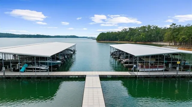 a view of house with swimming pool yard and outdoor seating