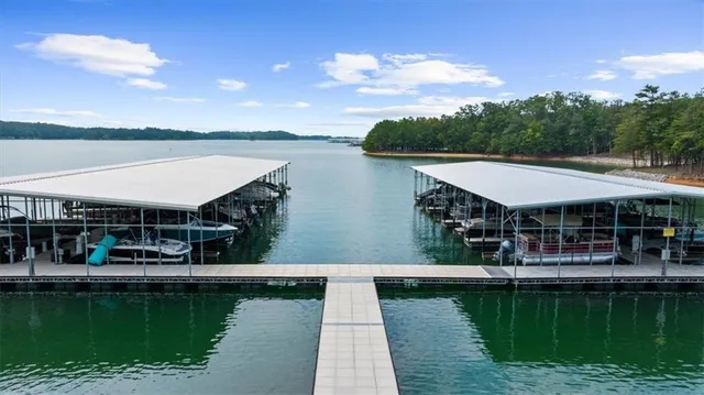 a aerial view of a house with a lake view