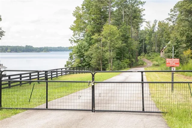 a view of a swimming pool with a lake view