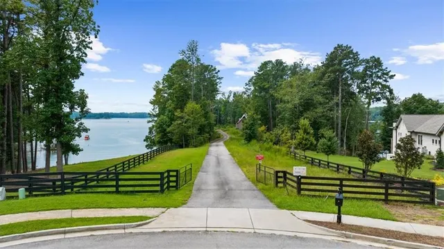 a view of park with large trees
