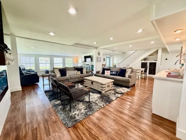 a kitchen with stainless steel appliances a refrigerator sink and cabinets