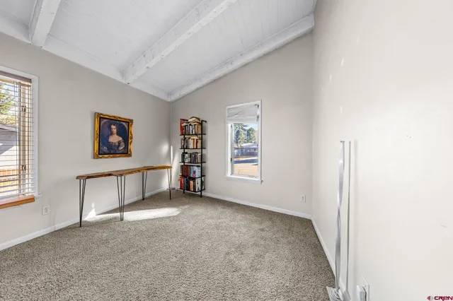 a view of an empty room and window