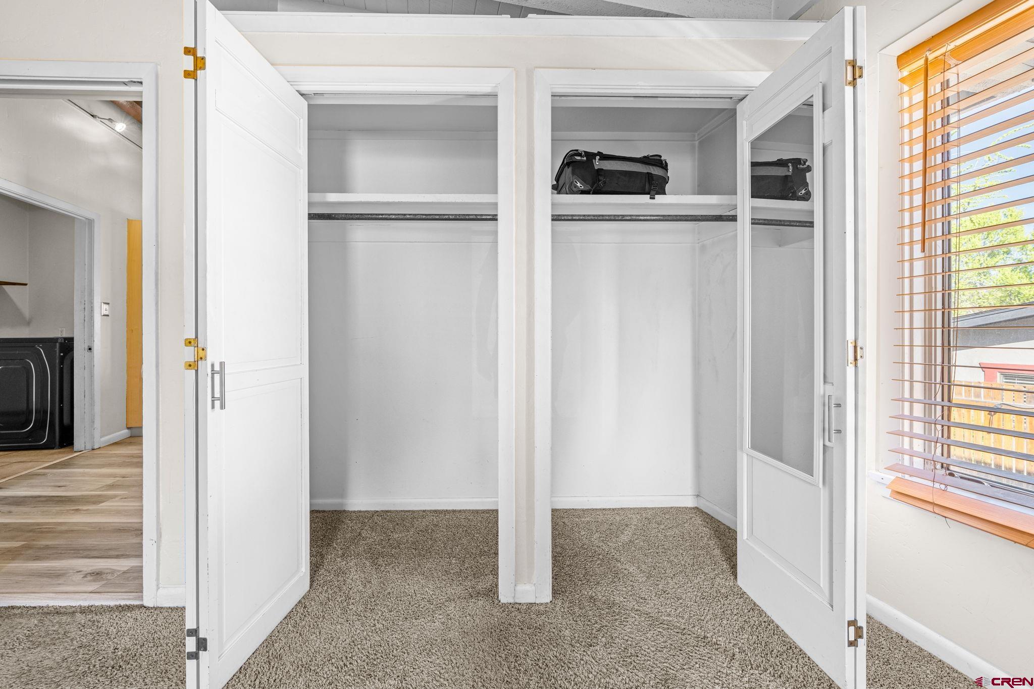 17 Maple Drive Durango, CO 81301 - Photo 15 of 44 a view of a livingroom with wooden floor and windows