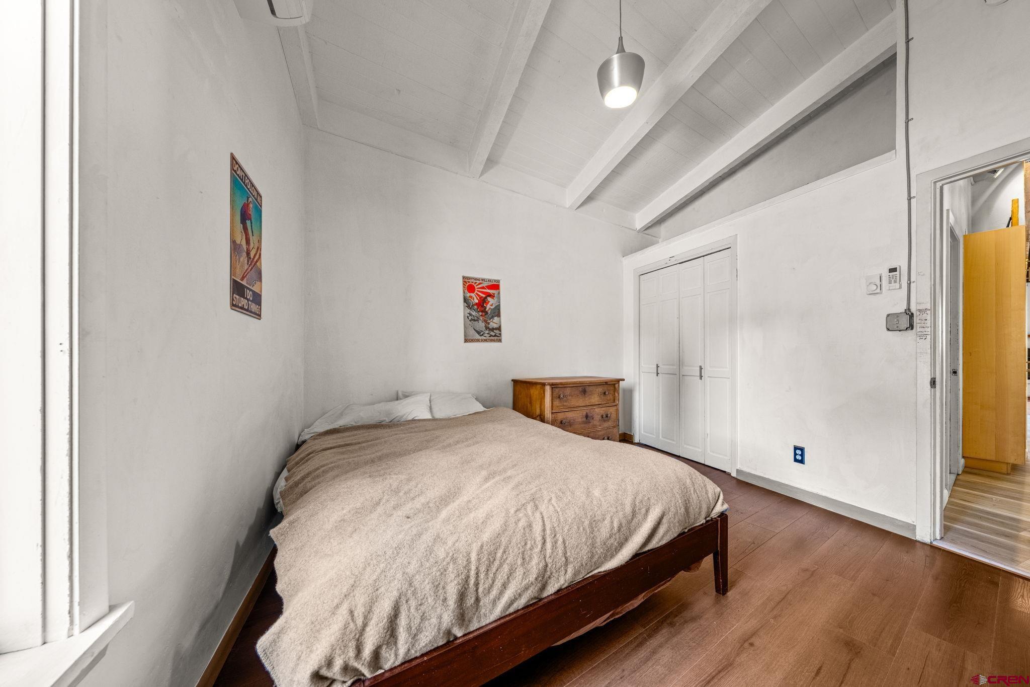 17 Maple Drive Durango, CO 81301 - Photo 17 of 44 a bedroom with a bed and a window