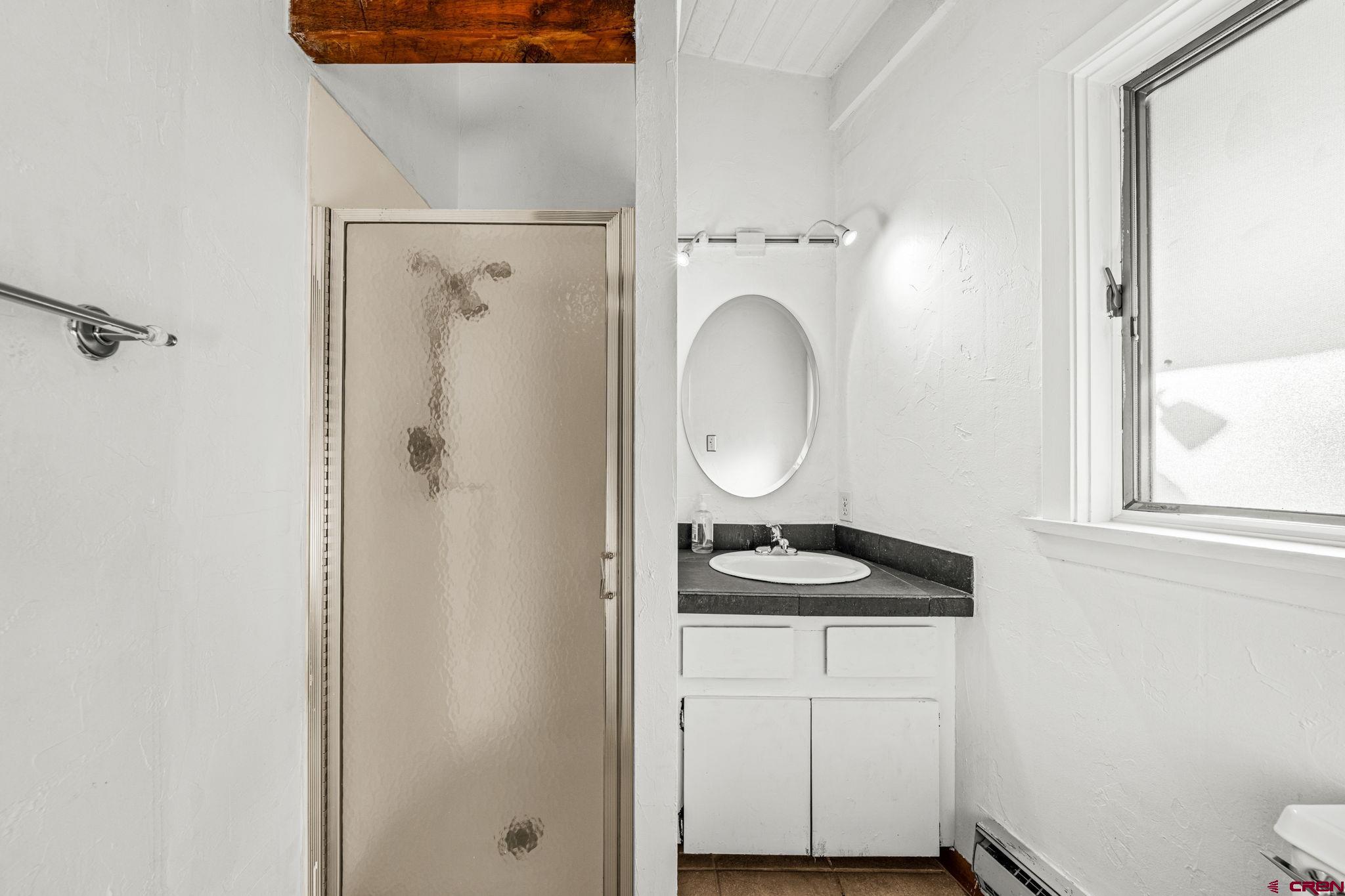 17 Maple Drive Durango, CO 81301 - Photo 21 of 44 a bathroom with a sink a toilet and a mirror