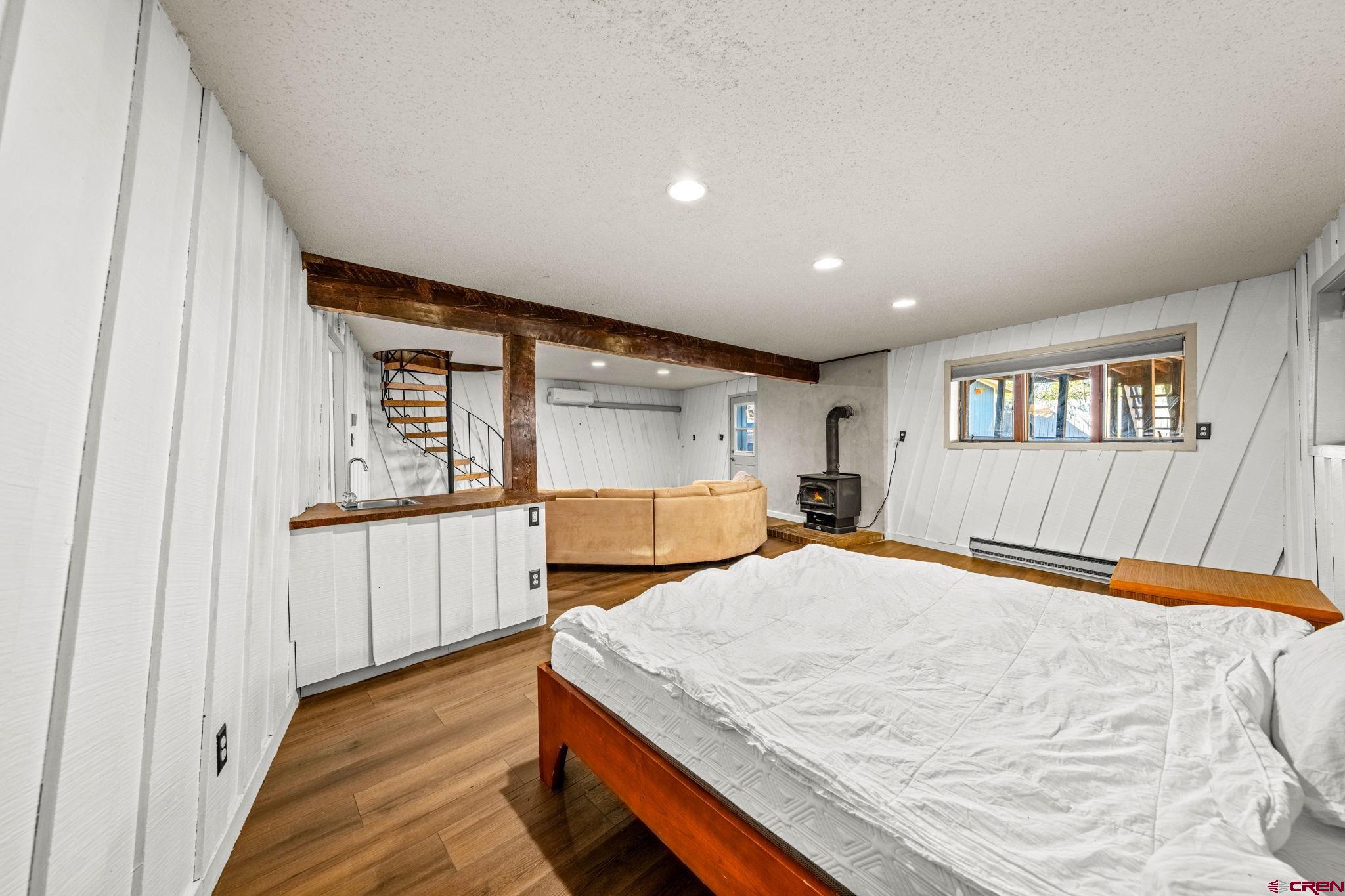 17 Maple Drive Durango, CO 81301 - Photo 24 of 44 a bedroom with a large bed and a window