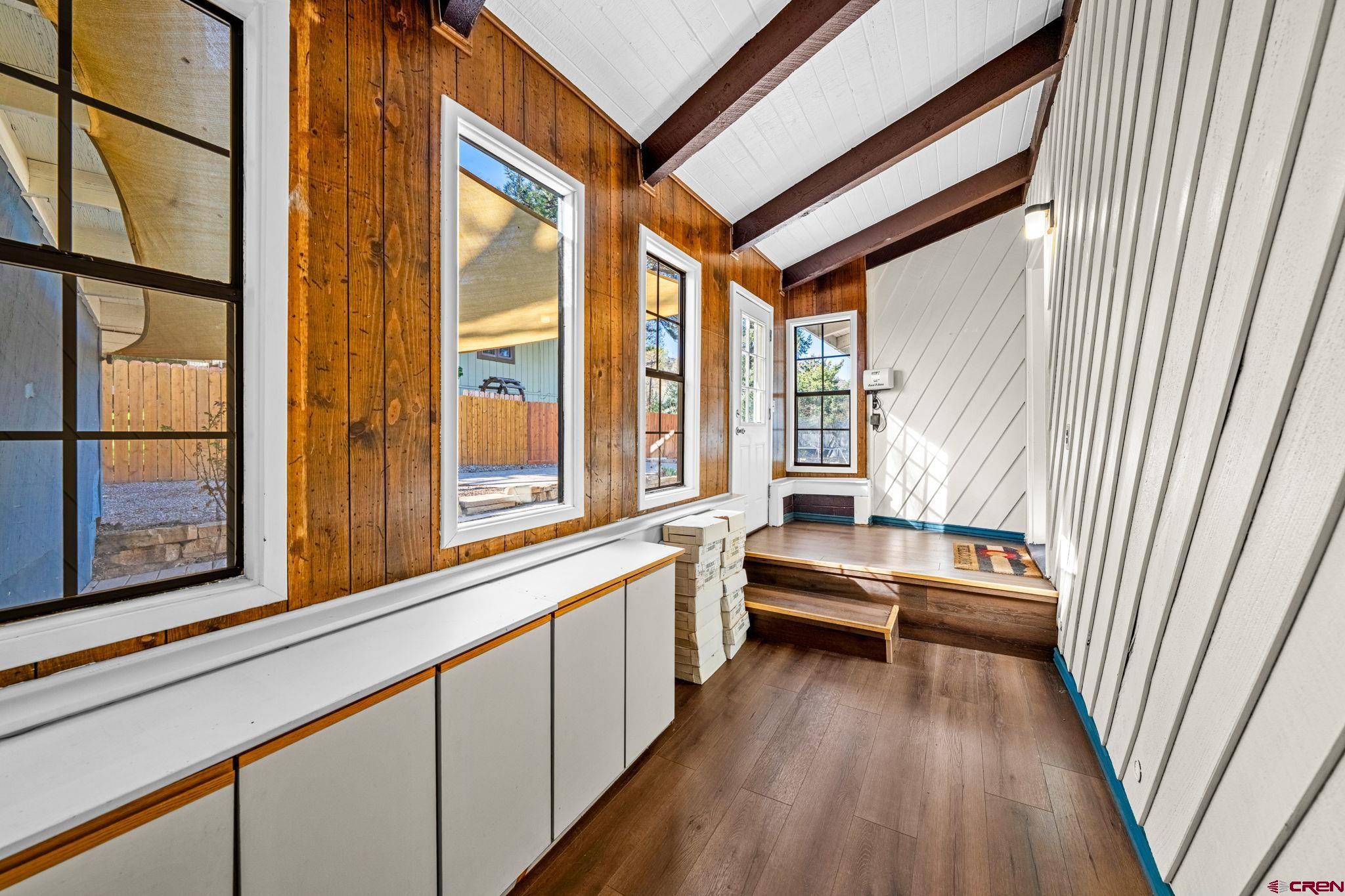 17 Maple Drive Durango, CO 81301 - Photo 29 of 44 a view of a large room with wooden floor and furniture