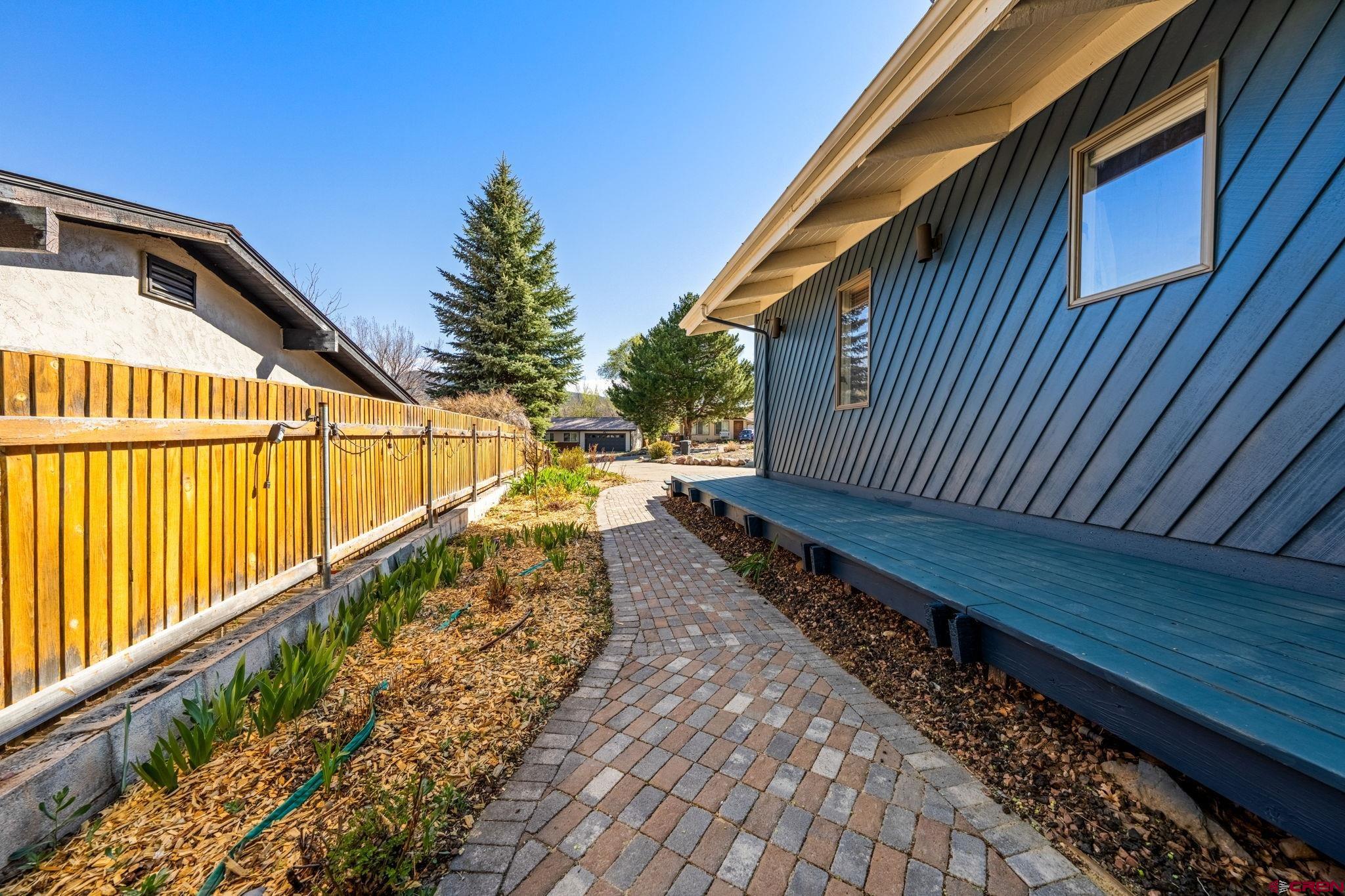 17 Maple Drive Durango, CO 81301 - Photo 34 of 44 a view of a small yard with wooden fence