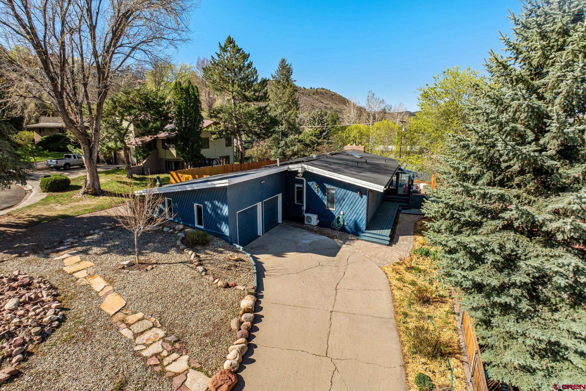 17 Maple Drive Durango, CO 81301 - Photo 38 of 44 a view of a house with a yard