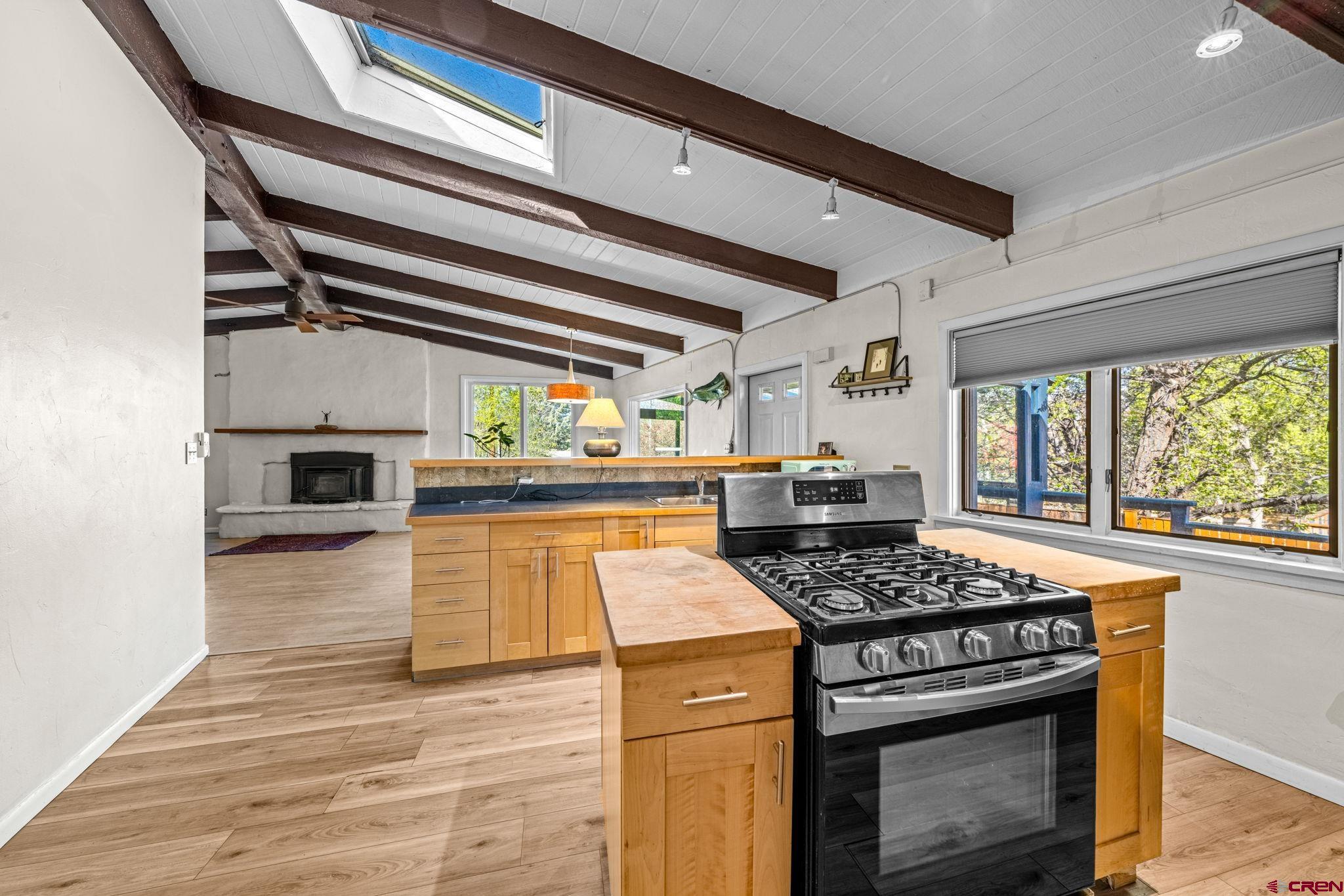 17 Maple Drive Durango, CO 81301 - Photo 5 of 44 a kitchen with stainless steel appliances granite countertop a stove and a sink