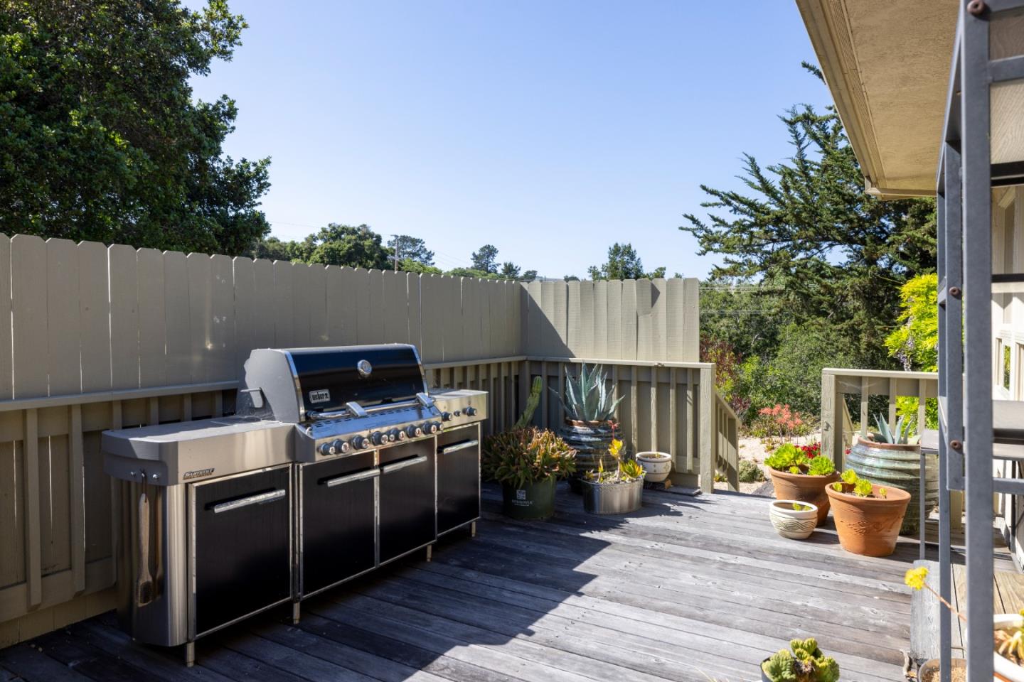 2 Mesa Del Sol Salinas, CA 93908 - Photo 20 of 61 a view of a patio with table and chairs with wooden floor and fence