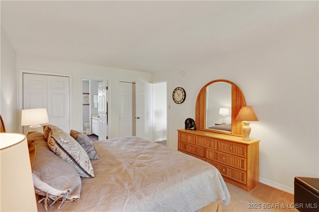 24 East Casa Del Rio, Unit 693 Lake Ozark, MO 65049 - Photo 22 of 30 Master bedroom view.