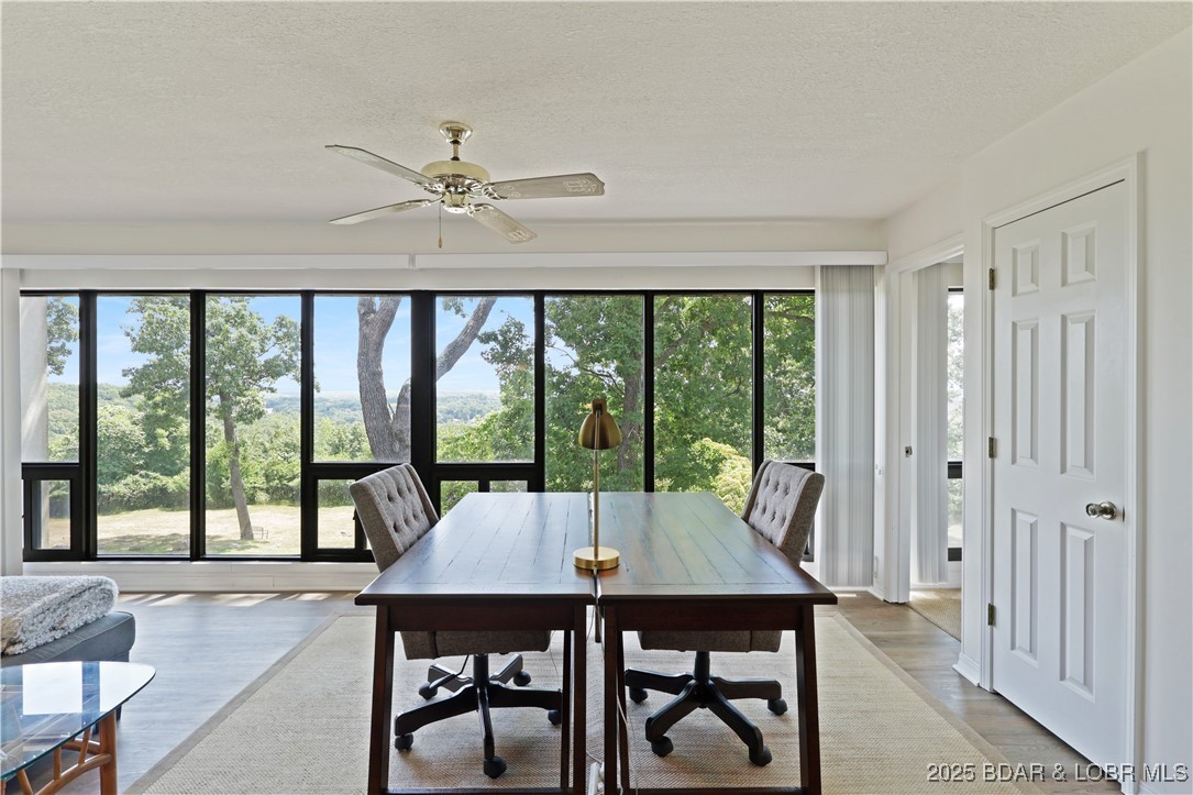 24 East Casa Del Rio, Unit 693 Lake Ozark, MO 65049 - Photo 24 of 30 Sunroom would be office or another living area.