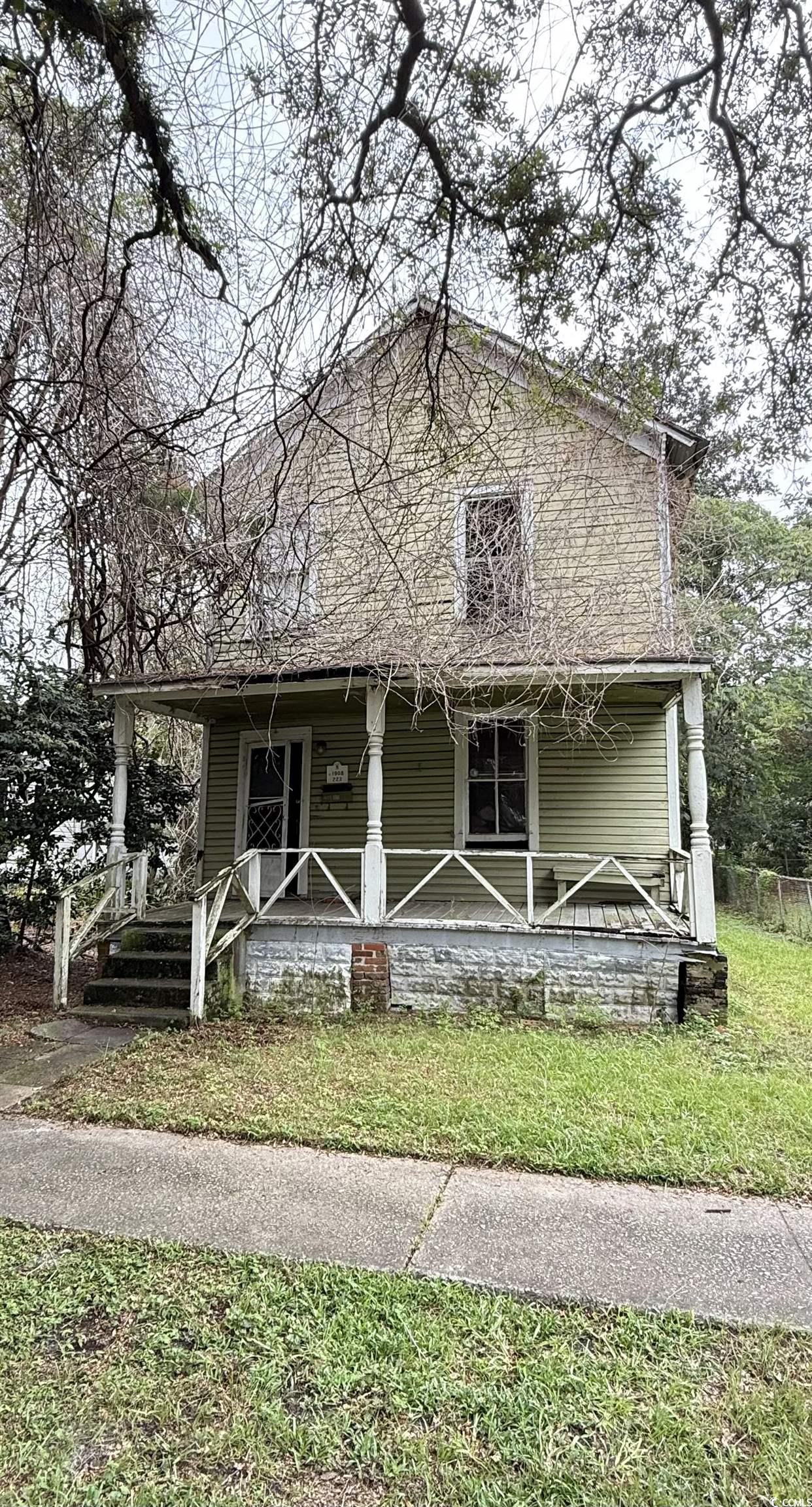 405 Orange Street Georgetown, SC 29440 - Photo 1 of 3 Farmhouse inspired home featuring a porch