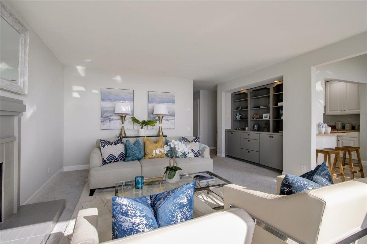 5007 Palmetto Avenue, Unit 42 Pacifica, CA 94044 - Photo 11 of 53 a living room with furniture and view of kitchen