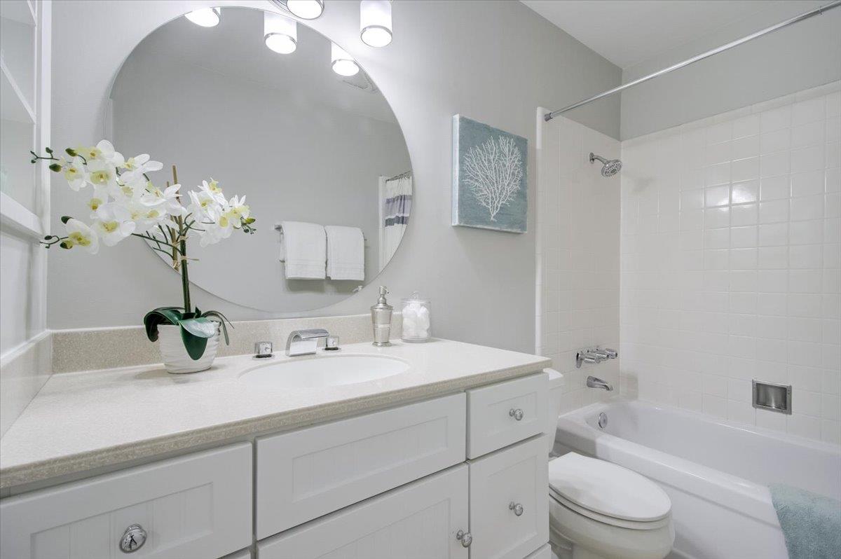 5007 Palmetto Avenue, Unit 42 Pacifica, CA 94044 - Photo 24 of 53 a bathroom with a sink a toilet and a bathtub