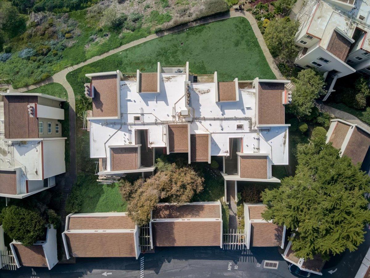 5007 Palmetto Avenue, Unit 42 Pacifica, CA 94044 - Photo 43 of 53 an aerial view of a house with a yard garden and outdoor seating