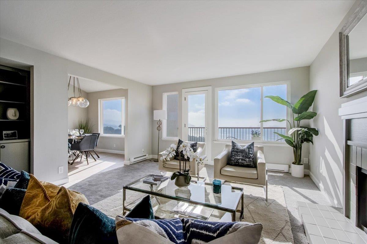 5007 Palmetto Avenue, Unit 42 Pacifica, CA 94044 - Photo 8 of 53 a living room with furniture and a large window