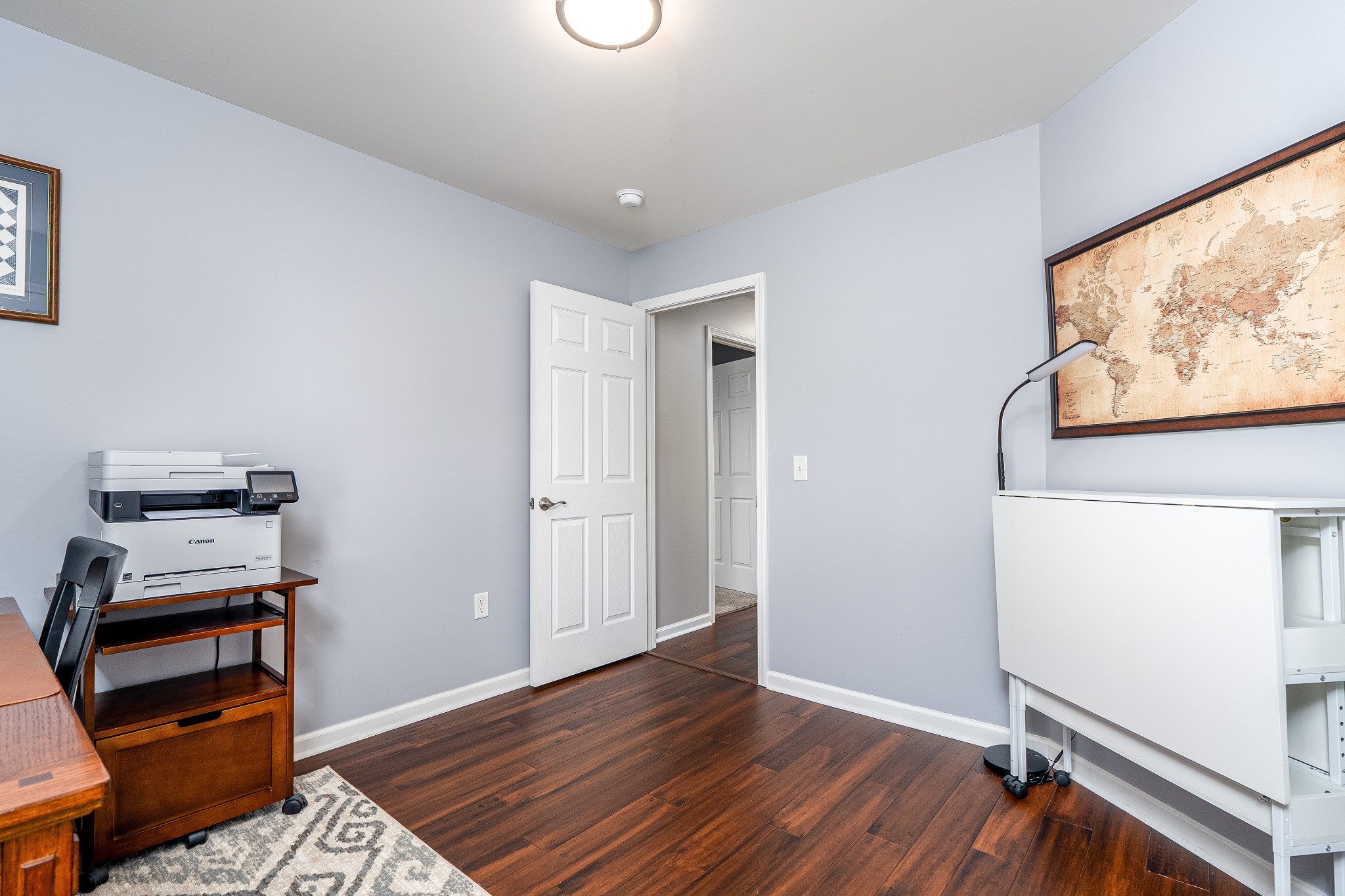 2102 Burgess Lane Spring Hill, TN 37174 - Photo 29 of 45 a view of a hallway with wooden floor and a window