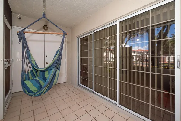a view of a swimming pool with lounge chair