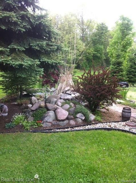 9435 Michigamme Road Clarkston, MI 48348 - Photo 4 of 35 Back Yard Garden Ponds #2.jpg