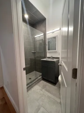 a bathroom with a sink and mirror