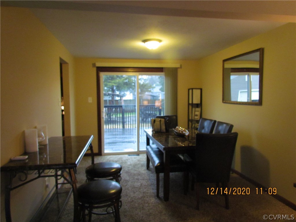 4136 Woodfield Road Richmond, VA 23234 - Photo 13 of 44 Great Room - Dining Area leading to deck.