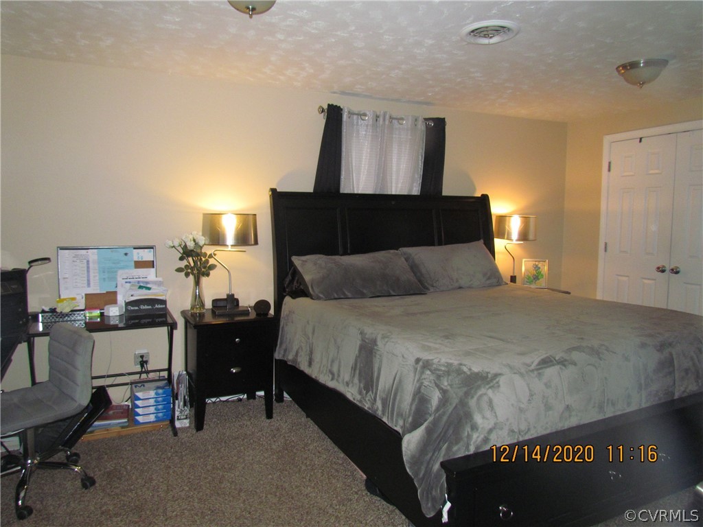 4136 Woodfield Road Richmond, VA 23234 - Photo 22 of 44 Spacious Master Bedroom. (As you see, a King size