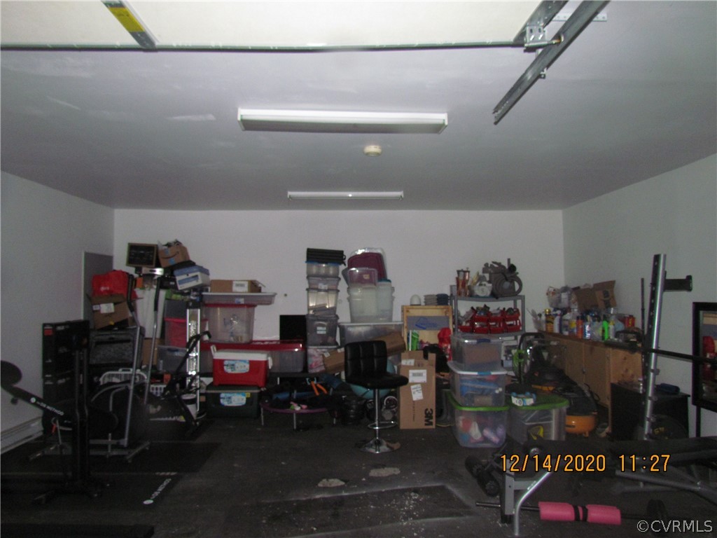 4136 Woodfield Road Richmond, VA 23234 - Photo 4 of 44 Garage is over sized, very spacious.