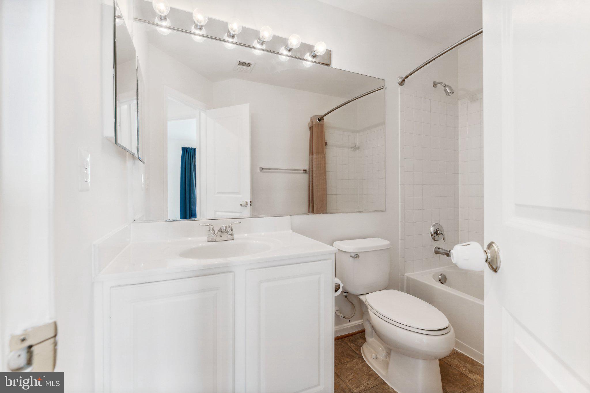 11896 Benton Lake Road Bristow, VA 20136 - Photo 18 of 27 Bright and modern bathroom retreat.