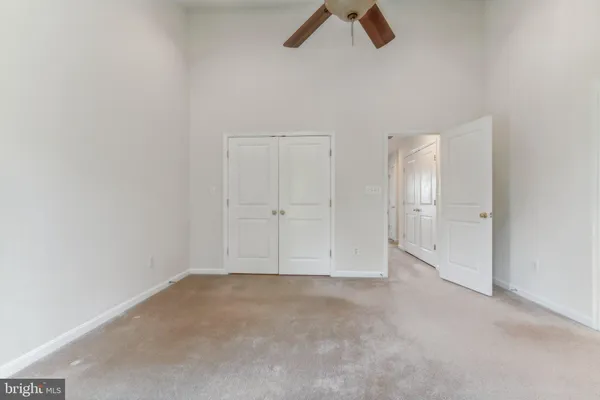 a bathroom with a sink and vanity
