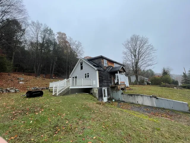 a house view with a outdoor space