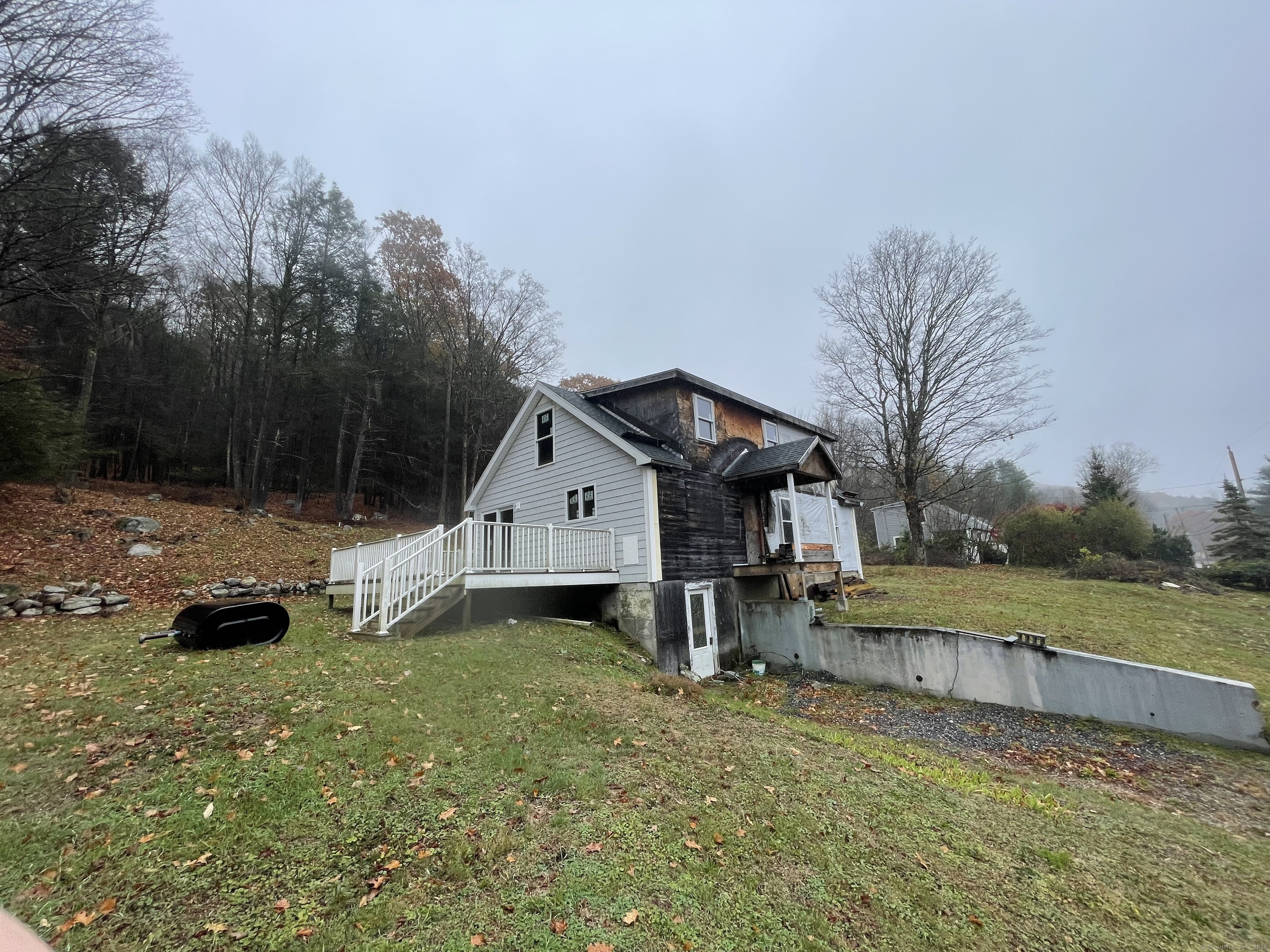 3748 Hall Meadow Road Goshen, CT 06058 - Photo 4 of 10 a house view with a outdoor space