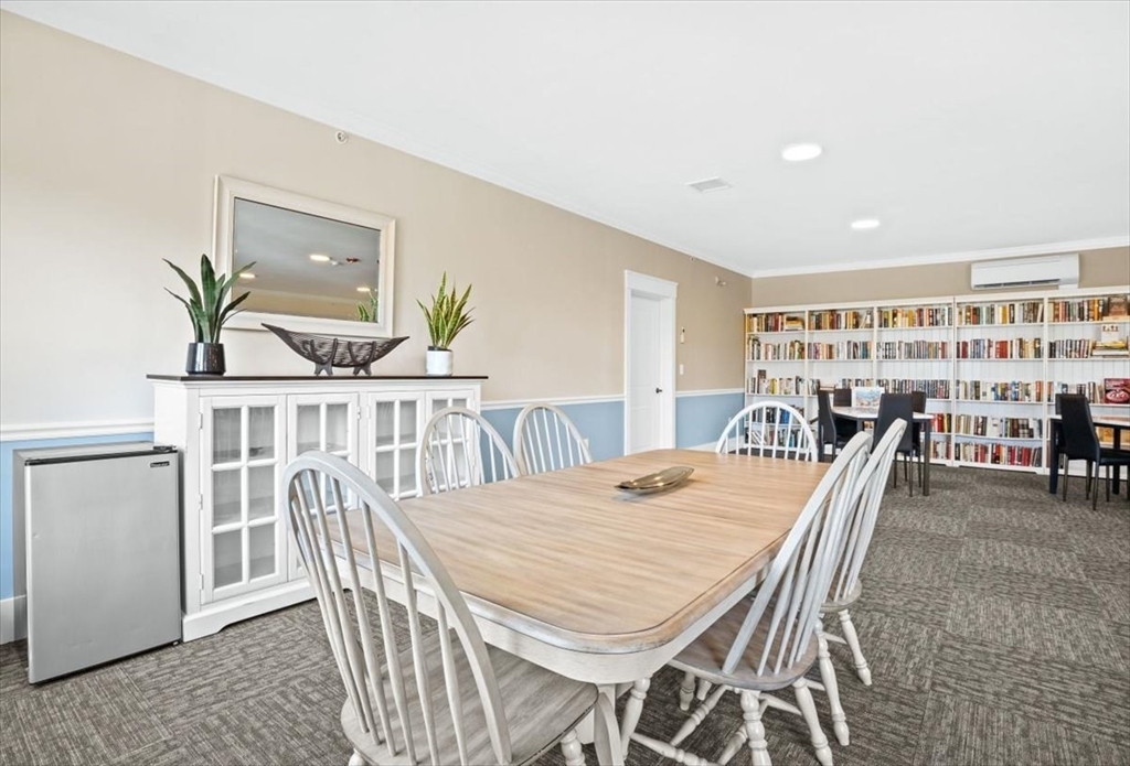 57 Long Point Road, Unit 206 Lakeville, MA 02347 - Photo 23 of 30 a view of a dining room with furniture