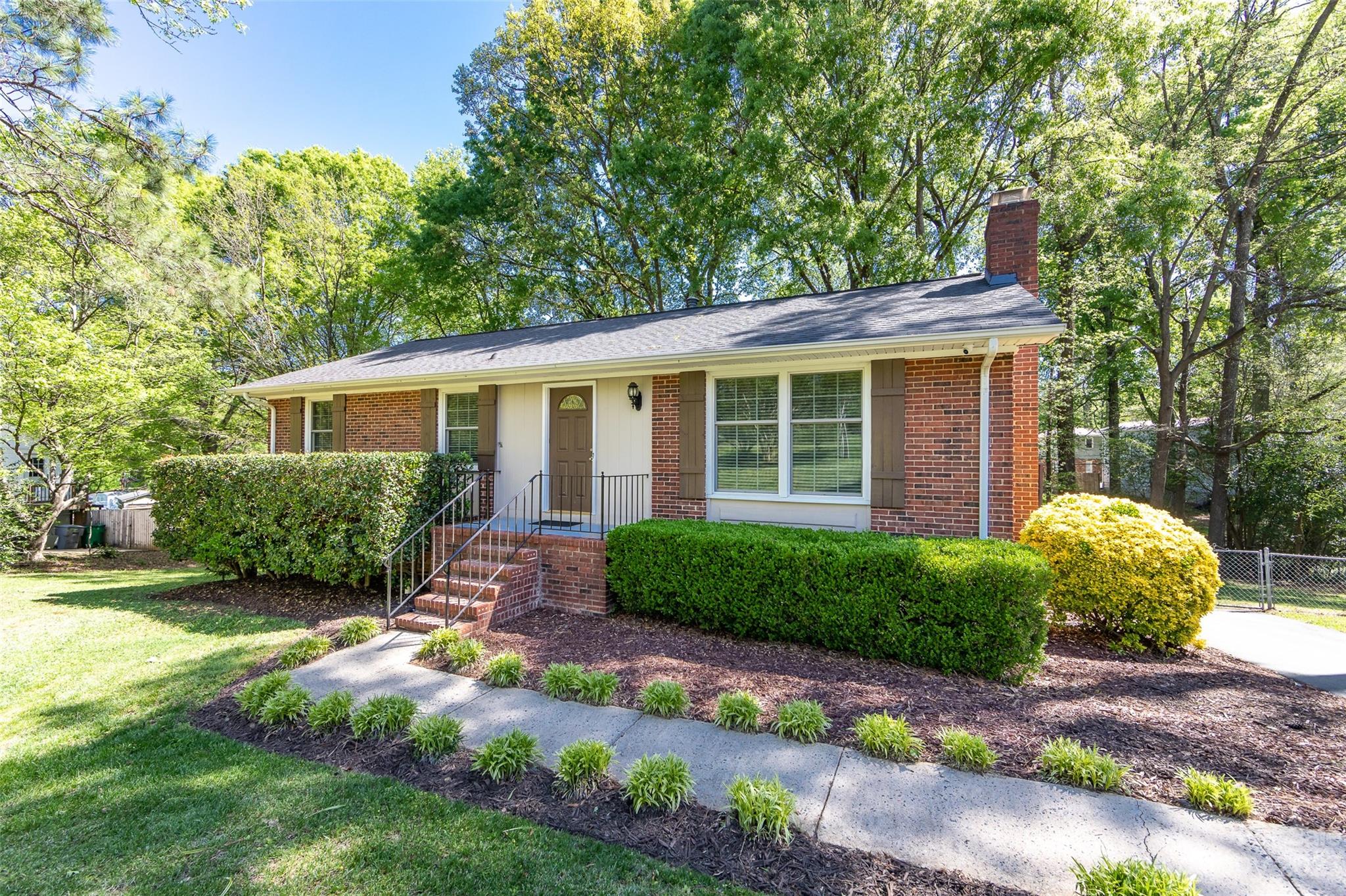 1506 Rama Road Charlotte, NC 28211 - Photo 2 of 48 a view of a house with a yard and plants