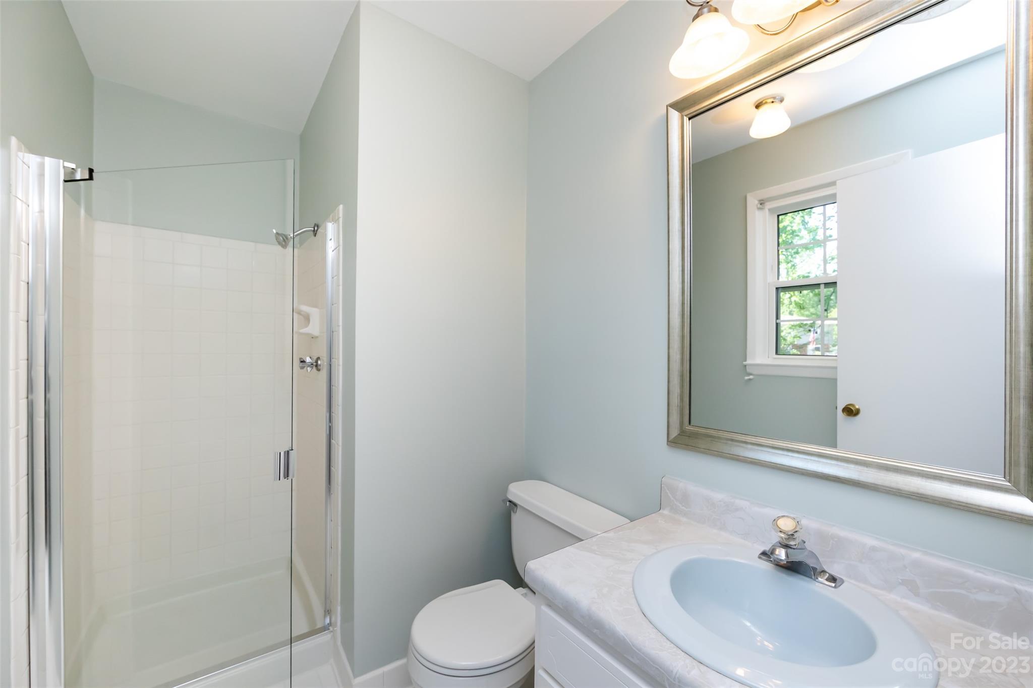 1506 Rama Road Charlotte, NC 28211 - Photo 23 of 48 a bathroom with a sink toilet and shower