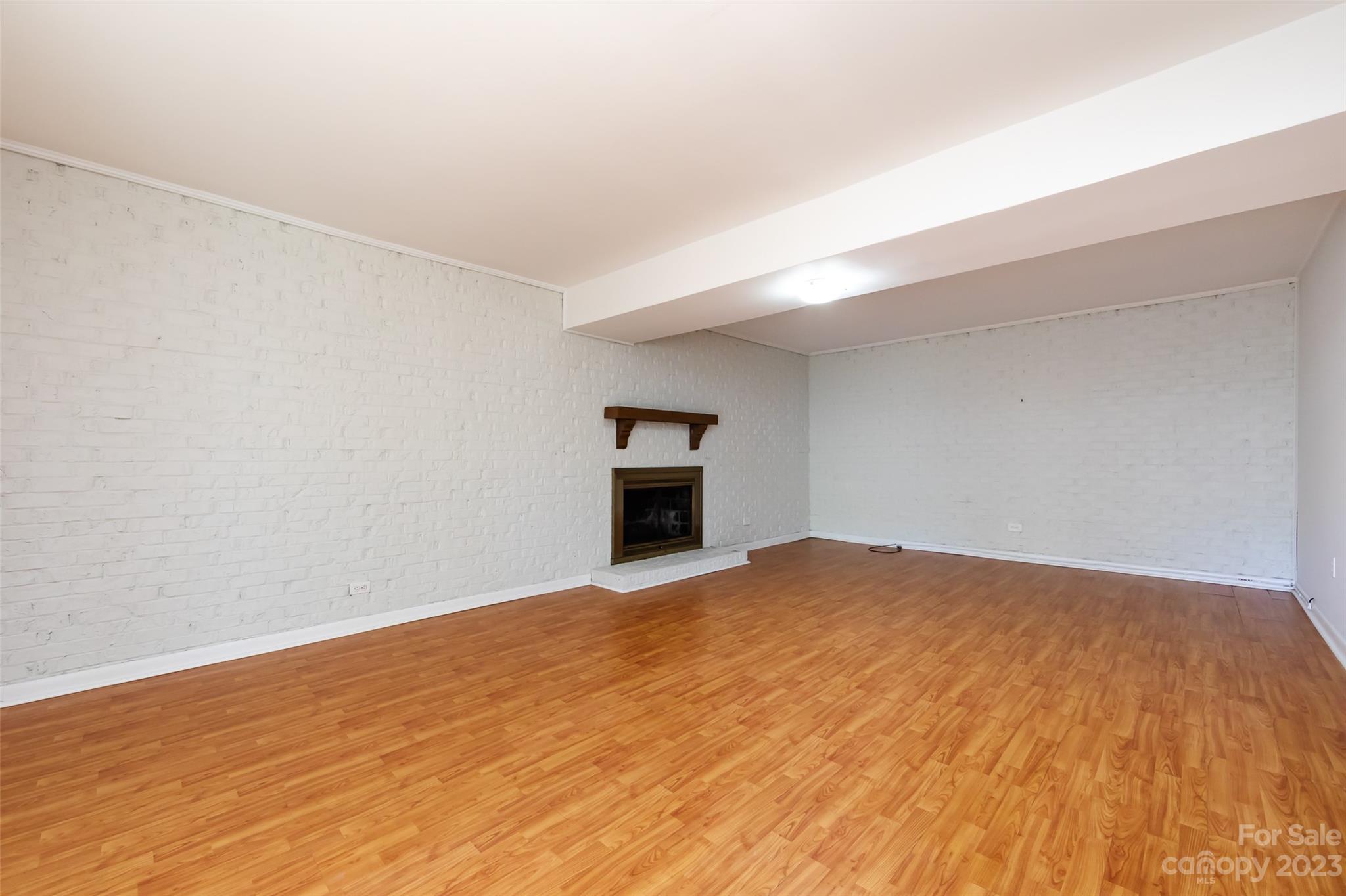 1506 Rama Road Charlotte, NC 28211 - Photo 32 of 48 a view of empty room with wooden floor