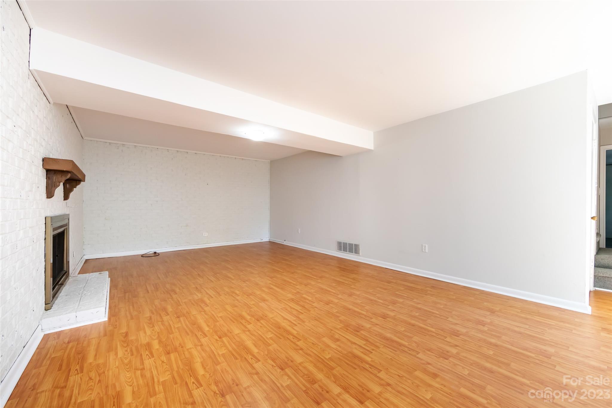 1506 Rama Road Charlotte, NC 28211 - Photo 33 of 48 a view of empty room with wooden floor