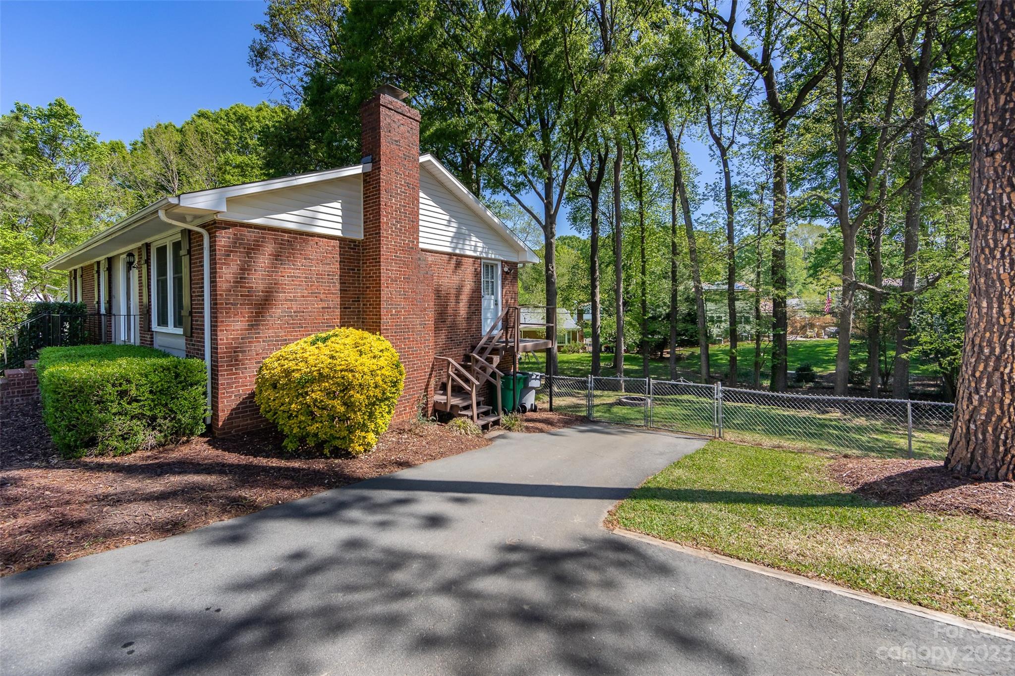 1506 Rama Road Charlotte, NC 28211 - Photo 41 of 48 a view of a house with backyard and garden