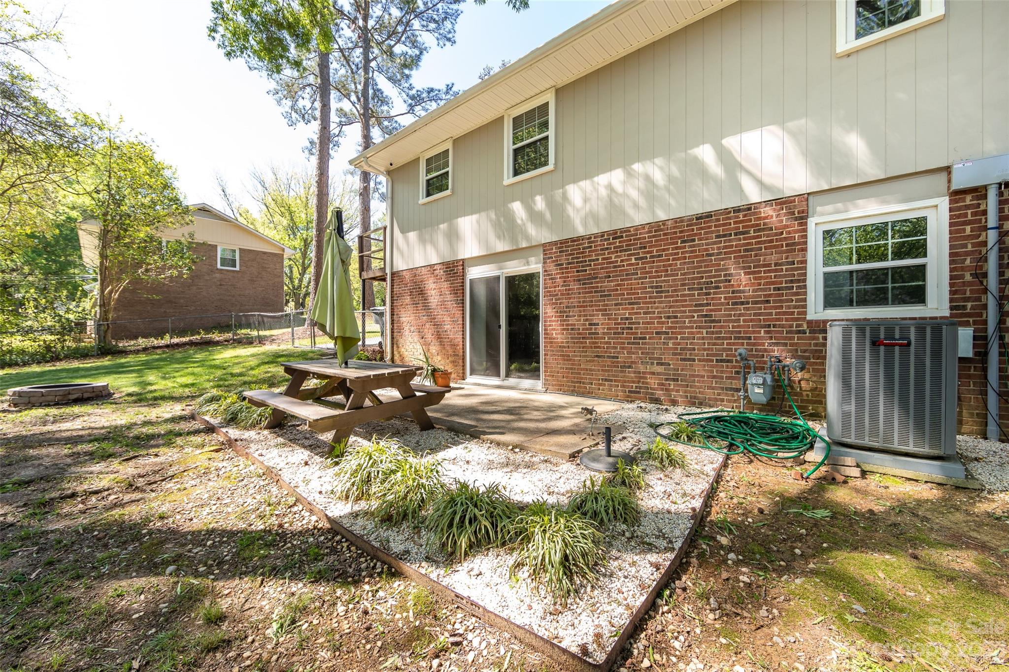 1506 Rama Road Charlotte, NC 28211 - Photo 47 of 48 a backyard of a house with yard and seating area