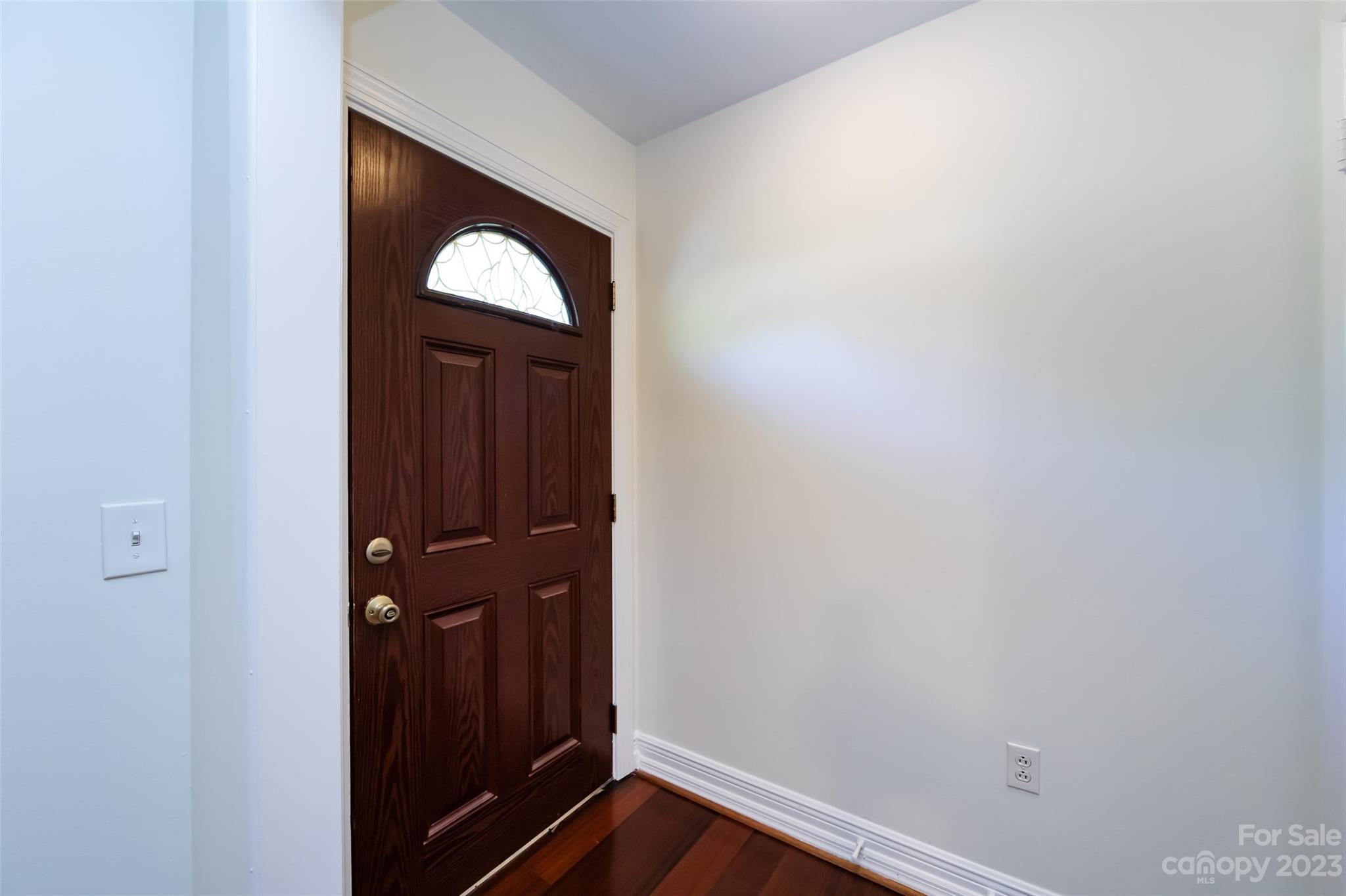 1506 Rama Road Charlotte, NC 28211 - Photo 5 of 48 a view of a hallway with wooden floor
