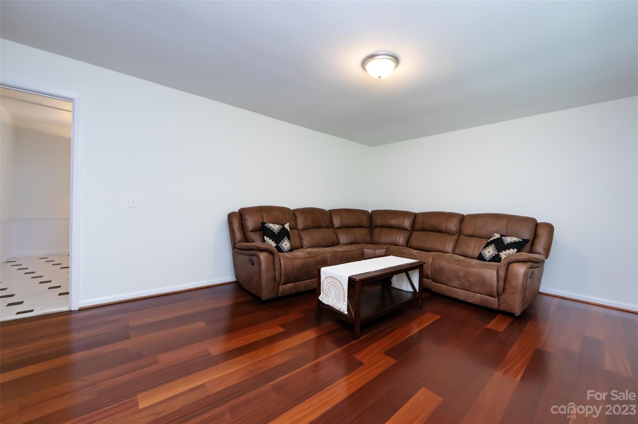 1506 Rama Road Charlotte, NC 28211 - Photo 8 of 48 a living room with furniture and wooden floor
