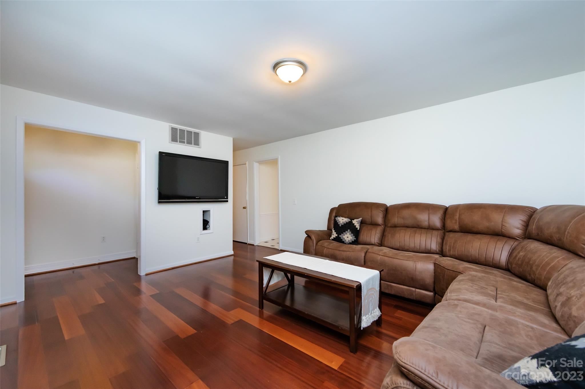 1506 Rama Road Charlotte, NC 28211 - Photo 9 of 48 a living room with furniture and a flat screen tv