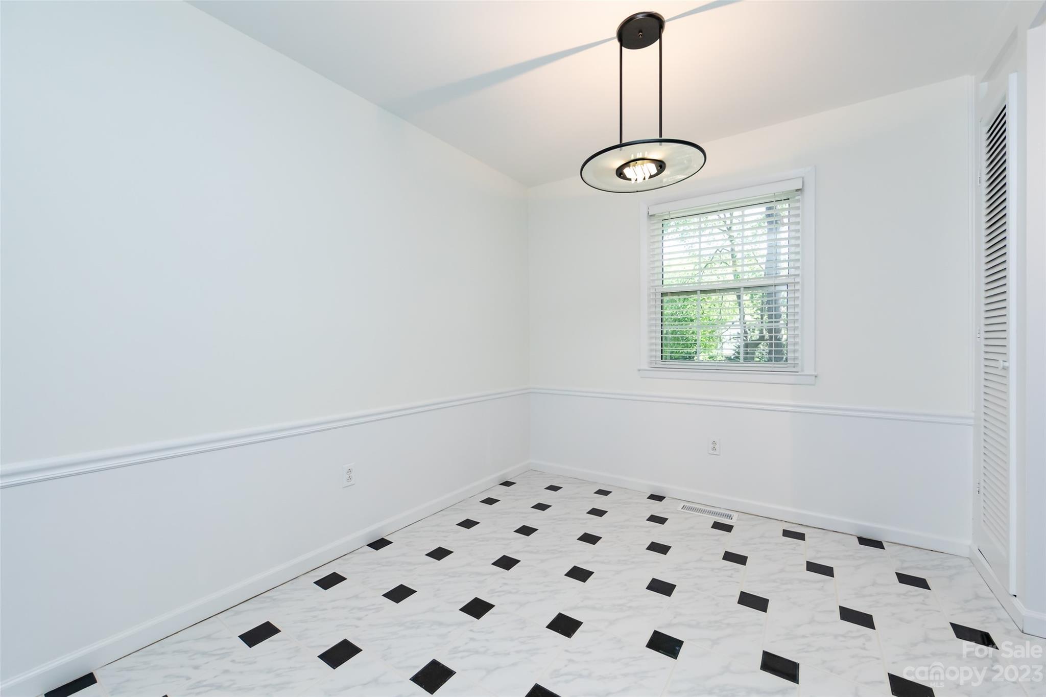 1506 Rama Road Charlotte, NC 28211 - Photo 10 of 48 a view of an empty room with a window