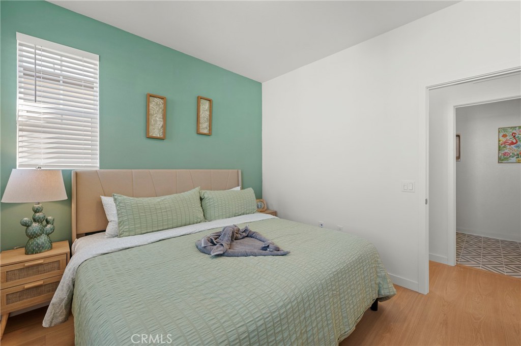 131 Ruby Road Rancho Mission Viejo, CA 92694 - Photo 33 of 65 a bedroom with a bed and a night stand
