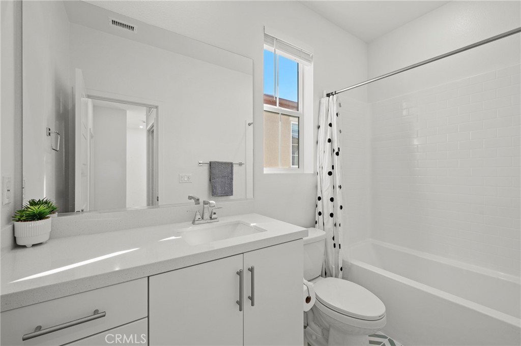 131 Ruby Road Rancho Mission Viejo, CA 92694 - Photo 35 of 65 a bathroom with a sink a toilet and shower