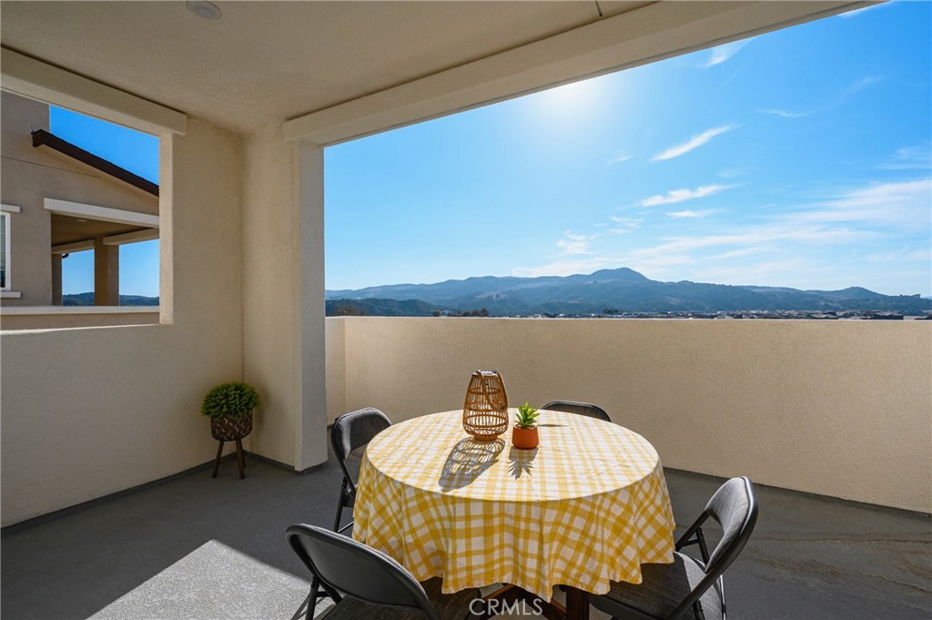 131 Ruby Road Rancho Mission Viejo, CA 92694 - Photo 43 of 65 a table and chairs in a room