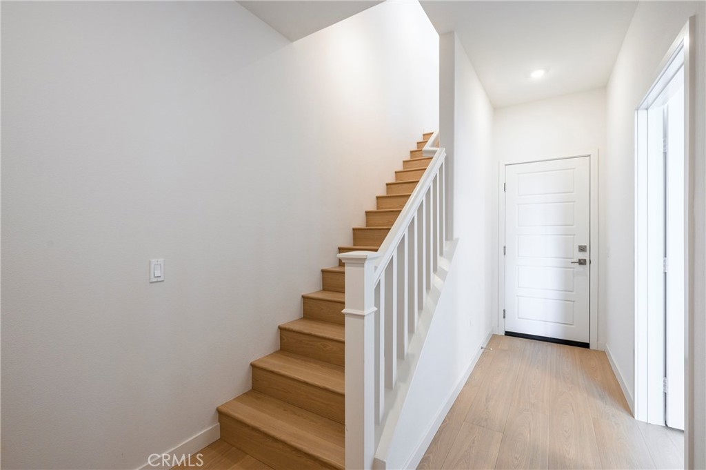 131 Ruby Road Rancho Mission Viejo, CA 92694 - Photo 5 of 65 a view of a hallway with stairs
