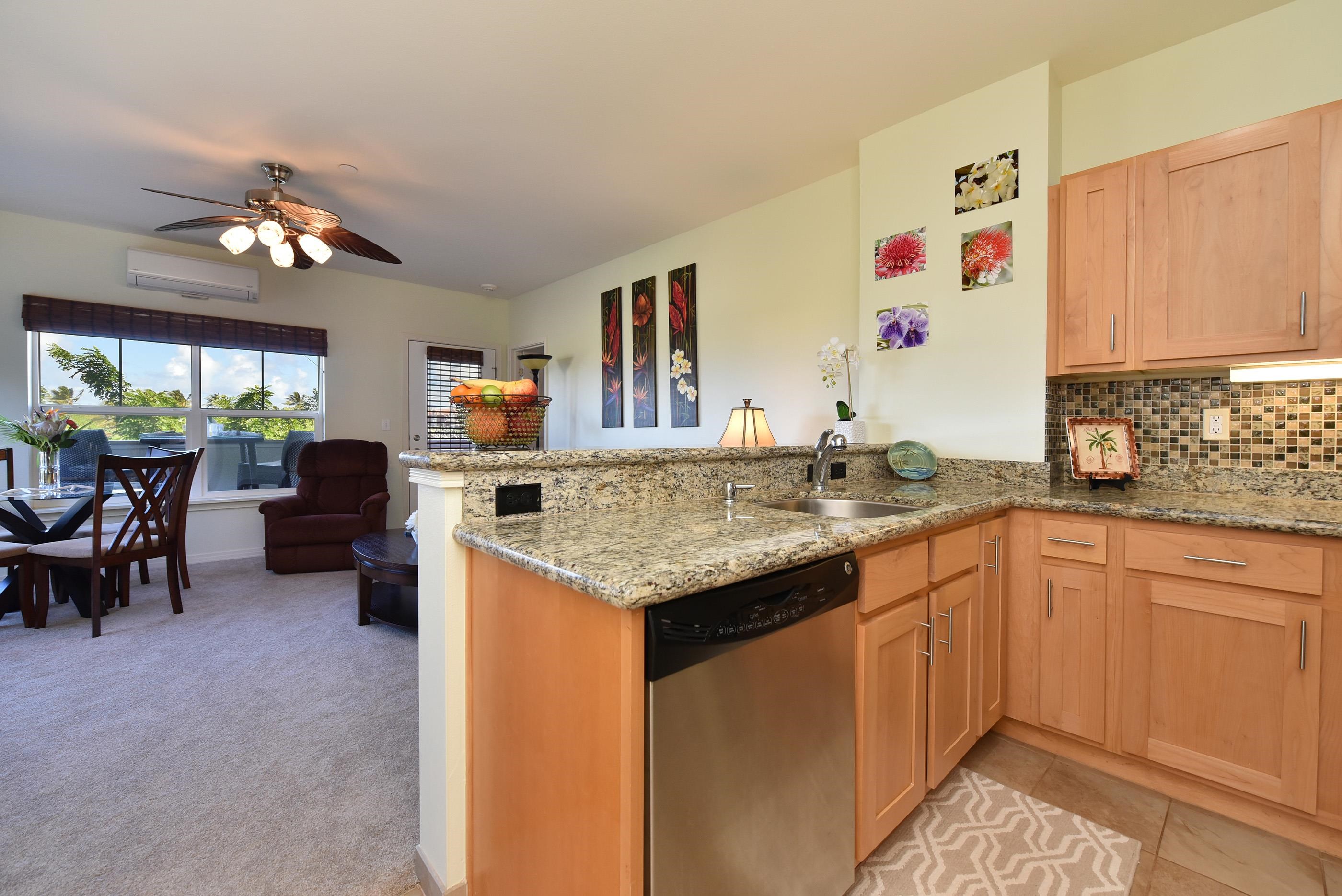 3708 Lower Honoapiilani Road, Unit E30 Lahaina, HI 96761 - Photo 5 of 30 a kitchen with a sink and cabinets