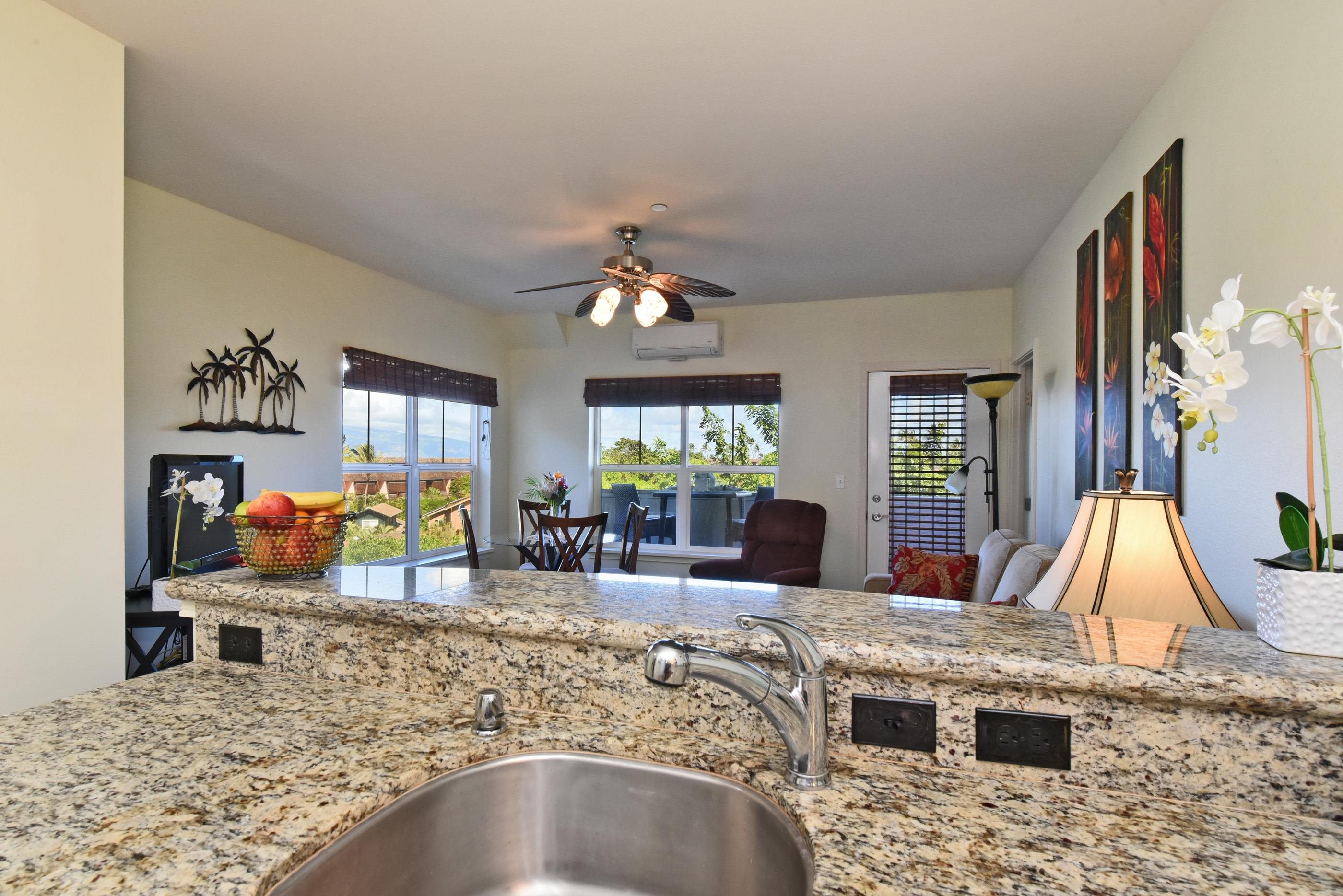3708 Lower Honoapiilani Road, Unit E30 Lahaina, HI 96761 - Photo 8 of 30 a view of a living room and dining room
